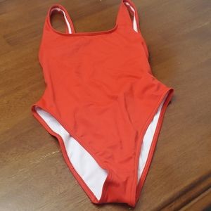 Red one piece suit